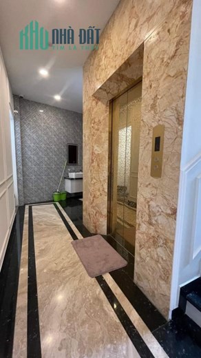 Mặt Phố Tôn Đức Thắng 100m2 7 tầng thang máy-vỉa hè-oto tránh-KD đỉnh 33 tỷ.