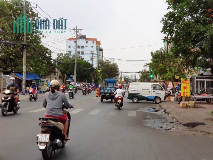 Bán nhà 4 tầng mặt tiền đường an dương vương, nhựa 10m, 66m2 chỉ 12.3 tỷ