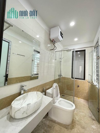 Bán nhà mặt ngõ ô tô lô góc xây 6 tầng thang máy dt 45 m2,mặt tiền 6 m giá 10,5 tỷ