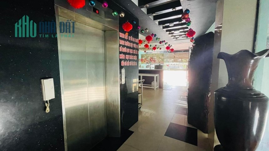 Bán toà Nhà 7 Tầng, 2 mặt tiền Nguyễn Văn Linh, Quận 7, DT: 10/14x25m, giá 75 tỷ (TL)