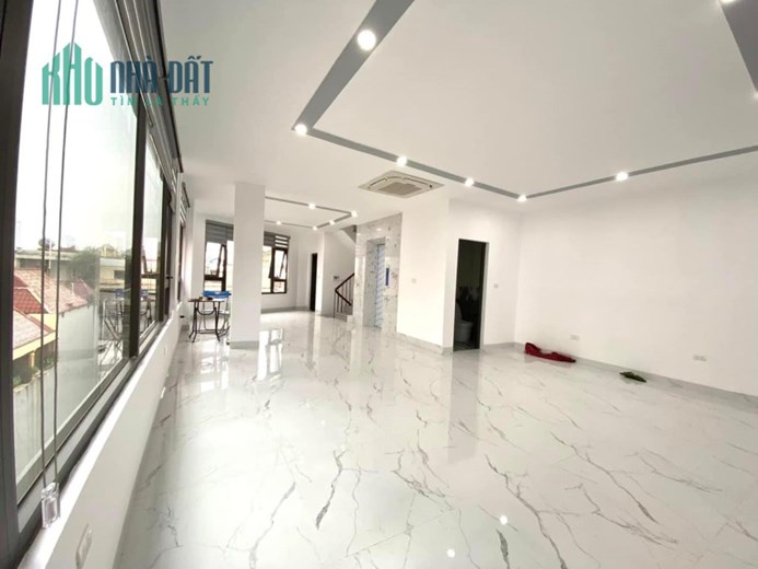 Bán tòa nhà 7 tầng thang máy mặt phố Xã Đàn, Đống Đa, mặt tiền rộng, kinh doanh, 47m, 36 tỷ