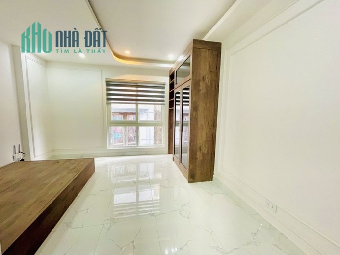 Bán nhà dòng tiền mới xây phố Thái Thịnh, ô tô, DT100m2 8 tầng thang máy chỉ 18 tỷ.
