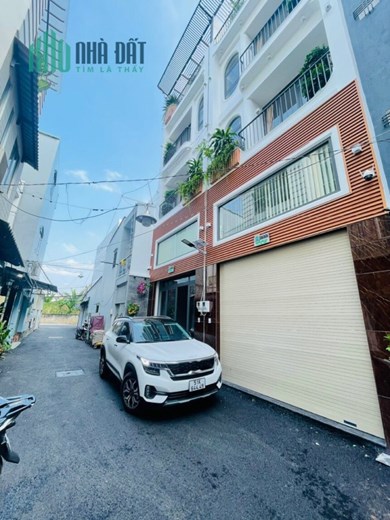 nhà LÊ VĂN SỸ P14 QUẬN 3 dt 80 m  6 tầng hxh 19 tỷ