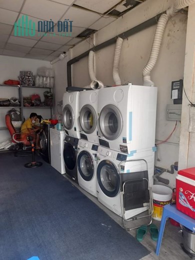 Do ko có ngưòi quản lý, cần sang lại tiệm giặt ủi mặt tiền đường Hoàng Văn Thụ, quận Tân Bình