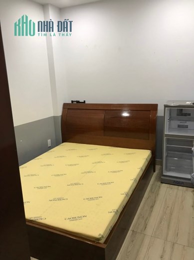 Bán nhà 5 tầng đối diện ĐH Cảnh Sát Quận7,doanh thu1.5tỷ năm,giá 2x tỷ