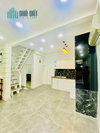 Bán nhà đường Nơ Trang Long quận Bình Thạnh diện tích 40 m2 có nở hậu.