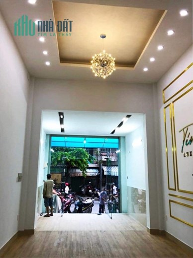 Mặt tiền kinh doanh Tôn Thất Thuyết Q4 Ngang 4 x 16 m nở hậu 6  đúc 5 tấm Giảm 1 tỷ thu nhập trên