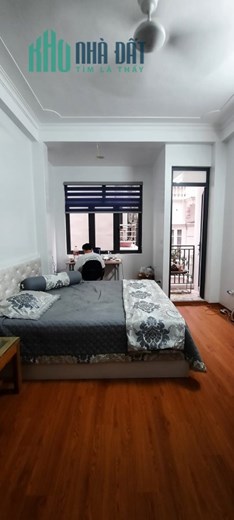 Cần Bán Nhà phố Chùa Láng KD ôtô đỗ cửa DT 50m2 6tầng MT 5,5m chỉ 5,5 tỷ.