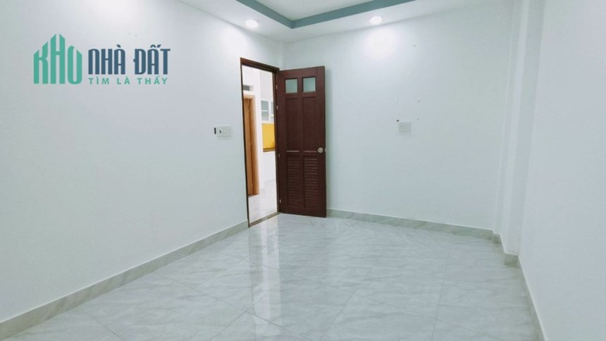 Bán nhà mặt tiền đường Nơ Trang Long quận Bình Thạnh diện tích 40 m2 nở hậu