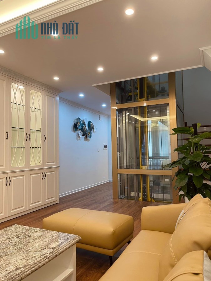 Bán Nhà Nguyễn Văn Huyên 7 Tầng Thang Máy Xịn-Gara 2 Ô Tô