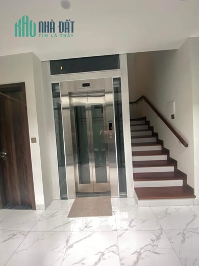 Bán nhà phố Hoàng Cầu - Đống Đa,5 tầng thang máy, MT 12m, ngõ to như phố, kinh doanh, văn phòng cực
