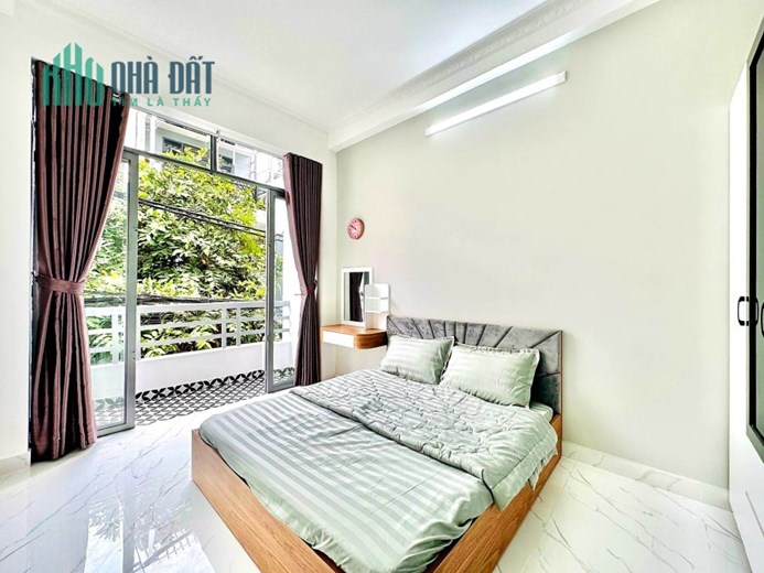 Nhà  Phan Huy Ích Phường 15  Tân Bình, Hẻm Xe Hơi Đường Nhựa, Thông Một Trục, 35m2 x 3 Tầng, 3 PN,