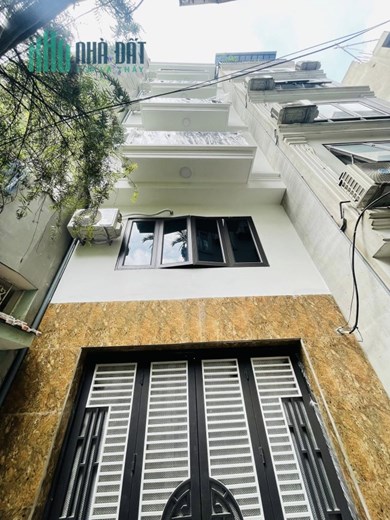 Tòa nhà phố Lê Đức Thọ ô tô 7T thang máy 12P khép kín DT 100tr/tháng
