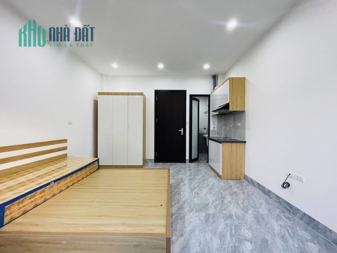 Tòa nhà phố Lê Đức Thọ ô tô 7T thang máy 12P khép kín DT 100tr/tháng