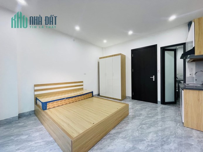 Tòa nhà phố Lê Đức Thọ ô tô 7T thang máy 12P khép kín DT 100tr/tháng