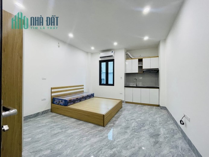 Tòa nhà phố Lê Đức Thọ ô tô 7T thang máy 12P khép kín DT 100tr/tháng