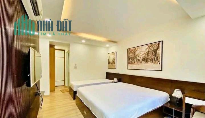 Bán nhà mặt phố Đông Tác, 60m2 x 8T, oto tránh, thang máy, kinh doanh vô đối, nhỉnh 15 tỷ.
