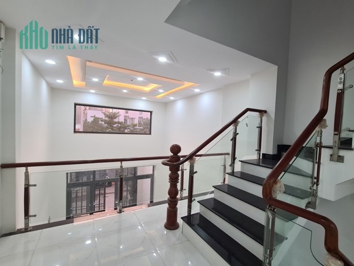 Nhà 2 mặt tiền Lê Đức Thọ hẻm xe hơi 7m, DT 4x16, 5 tầng giá 5tỷ6 có TL