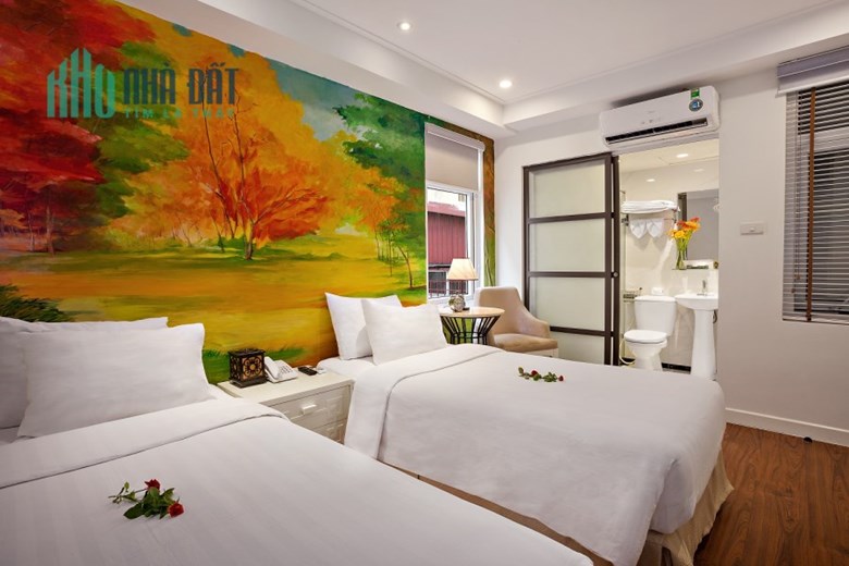 Bán tòa khách sạn phố Trần Hưng Đạo, DT 93m2 x 9 tầng thang máy, MT 7.8m.