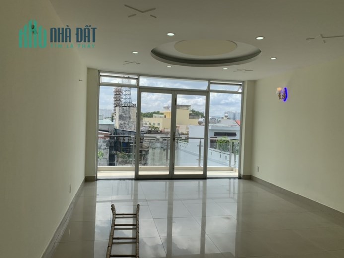 Bán nhà Mặt tiền Quận Tân Phú gần Văn Cao. DT 4.5x21, 5 tầng. Giá 13.5 tỷ TL