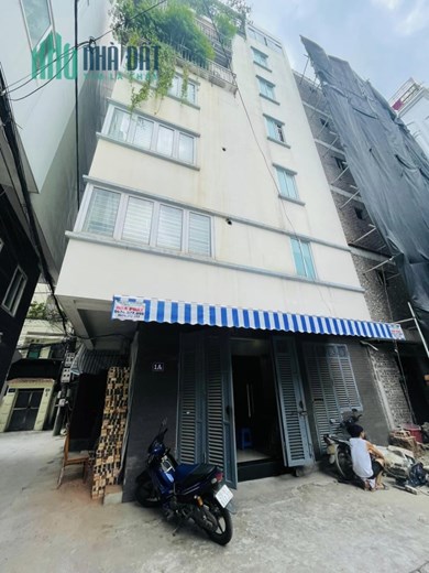Bán nhà mặt phố Vạn Bảo, ô tô đô cửa, kinh doanh đỉnh, 40m2, 7 tầng thang máy, lô góc, nhỉnh 14 tỷ
