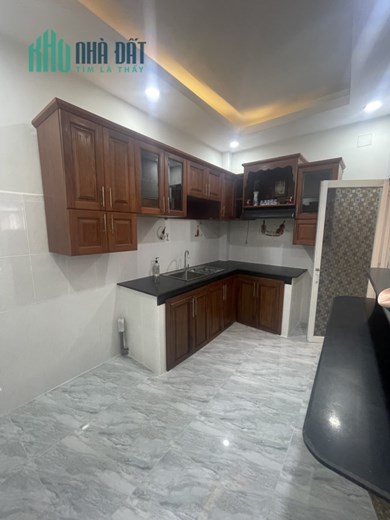 Bán nhà hẻm 5 mét Bùi Đình Túy. Ngang 4m, sổ nở hậu