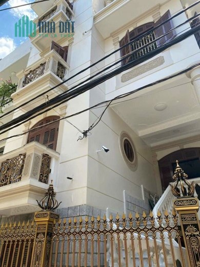 BIỆT THỰ TÂY HỒ, THANG MÁY, LÔ GÓC, VỊ TRÍ ĐẮC ĐỊA,  Ô TÔ ĐỖ CỔNG. 100m2 4 tầng mặt tiền 9m, giá 42