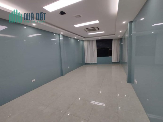 nhà mặt phố nguyễn văn huyên đường 40m vỉ hè kinh doanh 59m 36 tỷ 8T.