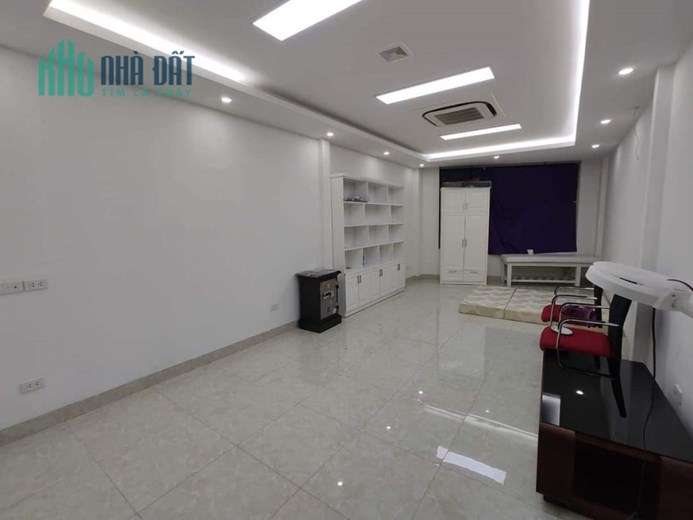 nhà mặt phố nguyễn văn huyên đường 40m vỉ hè kinh doanh 59m 36 tỷ 8T.