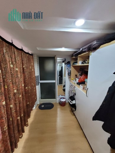 Bán nhà tập thể tầng 1 phố Trung Kính, ô tô  7 chỗ đỗ trước nhà thoải mái