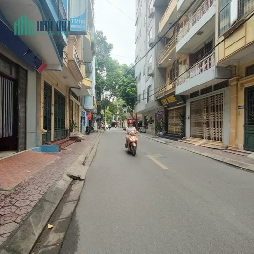 Bán nhà MP Nghĩa Đô, 5T, DT 60m, MT 5m, thang máy, lô góc, vỉa hè, KD sầm uất. Giá 14.8 tỷ.