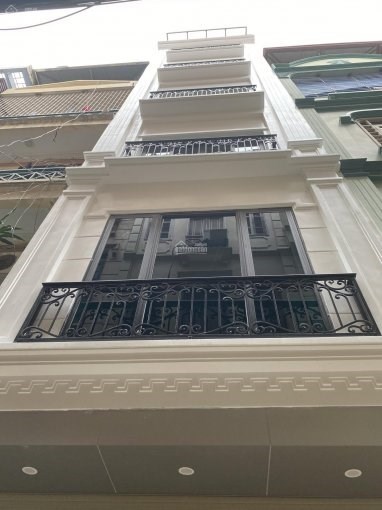 bán gấp căn nhà 152 xây mới 6 tầng thang máy vị  phố Hào Nam Cát Linh Đống Đa dt 42 m2 giá 8,5 tỷ