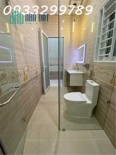 Nhà mới 100% mặt tiền DX 115 DT 130m2 giá chỉ 3,320 đường nhựa rộng 8m thông LH 0933 299 789