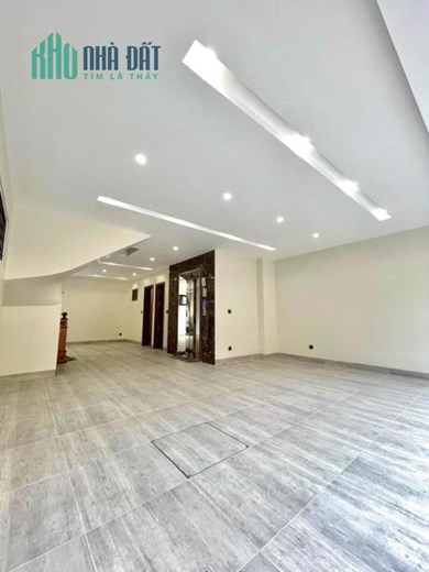 Bán nhà ngõ 89 phố Nguyễn Phong Sắc, DT 69m2 x 7T, ô tô tránh, nhà đẹp, thang máy, 18.2 tỷ