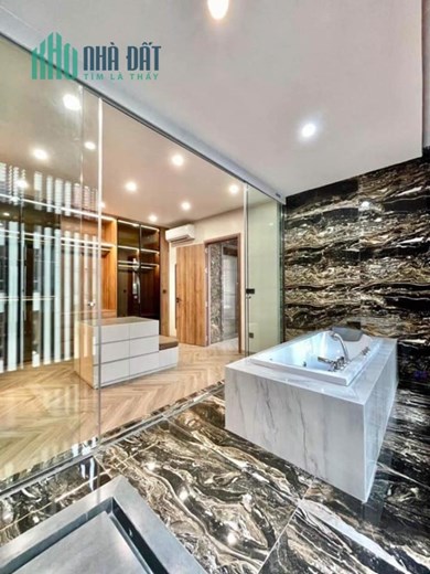 Bán nhà ngõ 89 phố Nguyễn Phong Sắc, DT 69m2 x 7T, ô tô tránh, nhà đẹp, thang máy, 18.2 tỷ