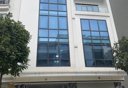 Cho thuê nhà Ngã Tư Sở, 100m2 6 tầng mặt tiền 6m thông sàn thang máy làm văn phòng