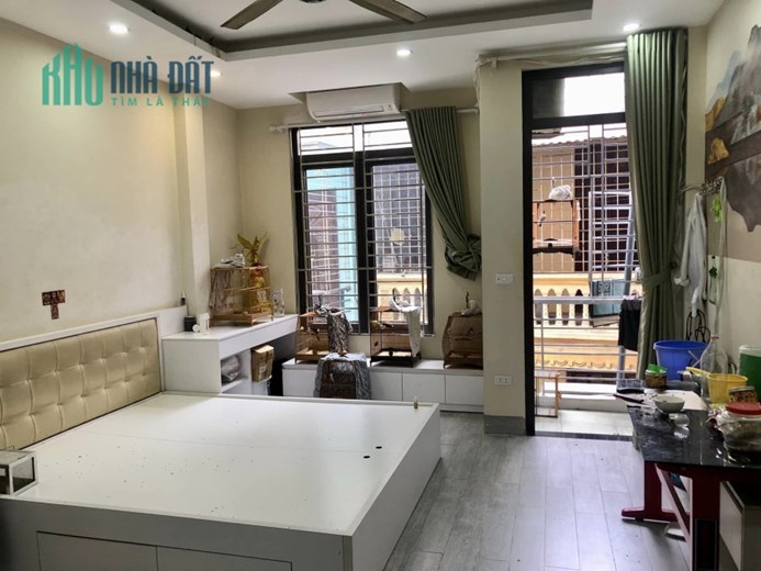 Bán nhà 5 tầng ngõ 4 Đặng Văn Ngữ Ô TÔ, S70 m, mặt tiền 6 m, giá 9,3 tỷ