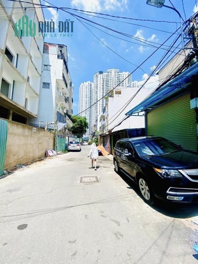 NHÀ  MẶT TIỀN ĐƯỜNG SỐ TRUNG TÂM QUẬN 7, 75m2, NGANG LỚN XE HƠI NGỦ TRONG NHÀ, 9,5 TỶ