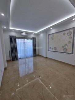 Bán nhà Lạc Lon Quân,Tây Hồ dt 47 m2 x 6 t thang máy mới tinh giá 6,35 tỷ