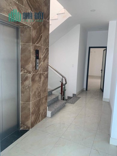 Bán toà nhà 6 Tầng Mặt tiền Bùi Đình Tuý - gần Nơ Trang Long, DT: 6.5/8x22m, giá 33.5 tỷ.