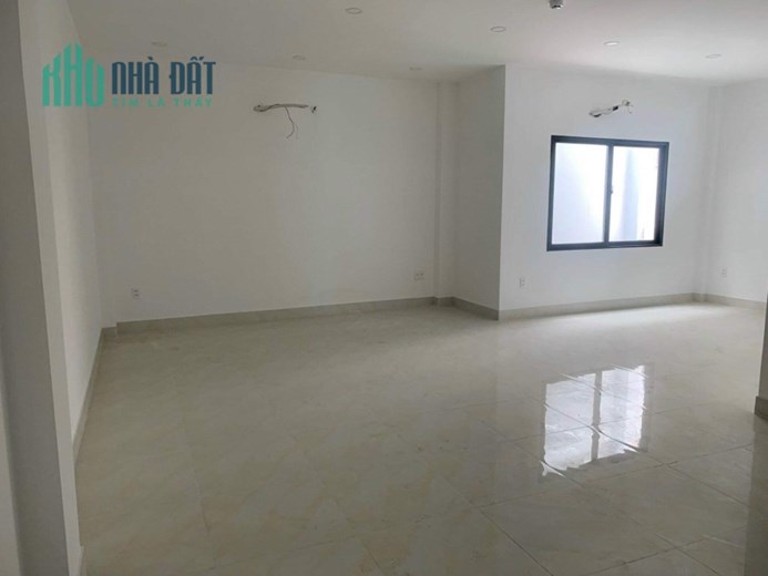 Bán toà nhà 6 Tầng Mặt tiền Bùi Đình Tuý - gần Nơ Trang Long, DT: 6.5/8x22m, giá 33.5 tỷ.