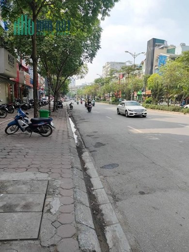[ ĐẲNG CẤP] TÒA VP MẶT PHỐ NGUYỄN HOÀNG 110M2, 9T, HÈ ĐÁ BÓNG, KD SẦM UẤT.