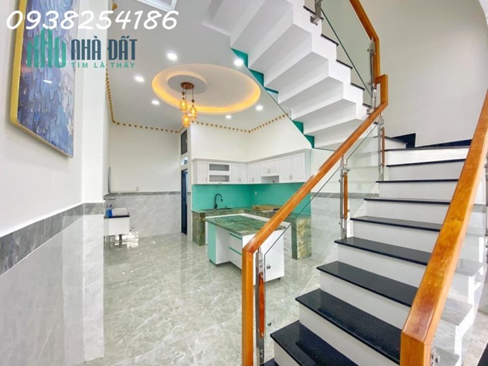 Bán nhà 1 sec lê văn quới 64m2 đúc 4 tấm hẻm xe hơi