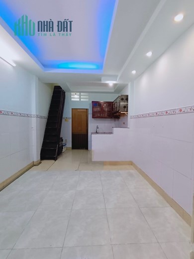 BÁN NHÀ 1 TRỆT 1 LẦU NGAY CHỢ HUỲNH VĂN CHÍNH