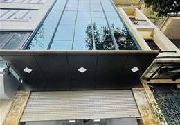 Tòa nhà mặt ngõ Phố Hoàng Cầu 75m2x8 tầng thang máy, lô góc, kinh doanh, vỉa hè ô tô tránh.
