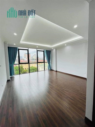 Tòa nhà mặt ngõ Phố Hoàng Cầu 75m2x8 tầng thang máy, lô góc, kinh doanh, vỉa hè ô tô tránh.