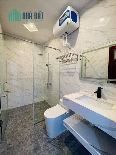 Bán nhà phố Hoàng Cầu Quận Đống Đa 75m2x7 tầng thang máy, kinh doanh, Văn phòng, 2 ô tô tránh.