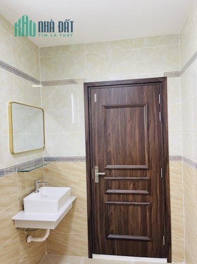 Bán gấp nhà mới xây HXH nở hậu 6,5/6,7m Đoàn Nguyễn Tuấn, Tân Quý Tây, Bình Chánh