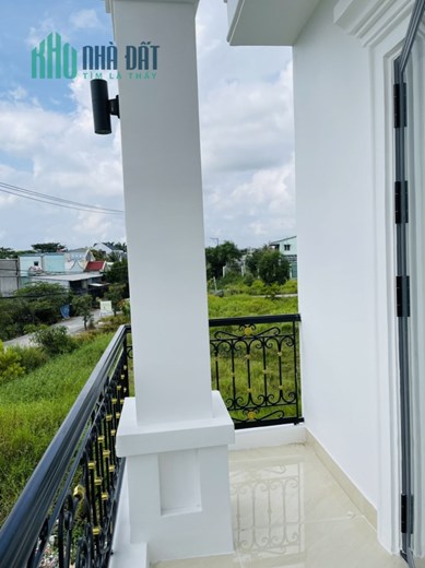 Bán gấp nhà mới xây HXH nở hậu 6,5/6,7m Đoàn Nguyễn Tuấn, Tân Quý Tây, Bình Chánh