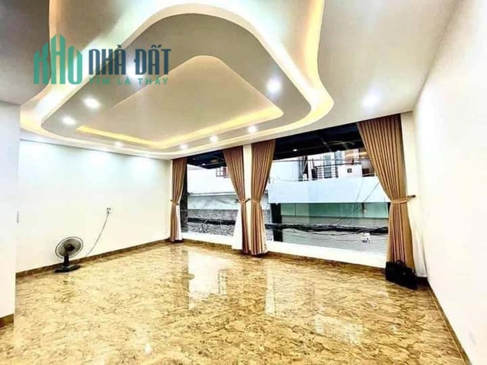 Bán Nhà Phố Nguyễn Khang 53/60m2 x 7 tầng thang máy, sát Phố, gara ô tô thông sàn kinh doanh, giá